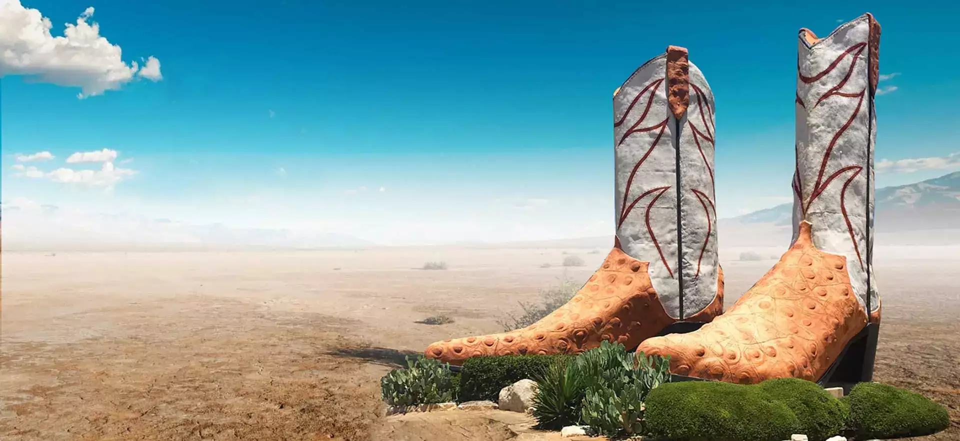 Giant ostrich cowboy boots standing in the Texas desert